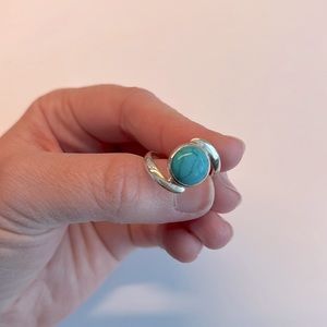Asymmetrical round turquoise ring in silver, approximately size 7